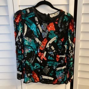 Beaded top. Long sleeve.